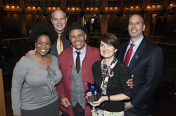 Ellen Alberding accepts her award alongside E. Faye Butler, Dev Kennedy, Ron OJ Parson, and Sean F. Taylor.