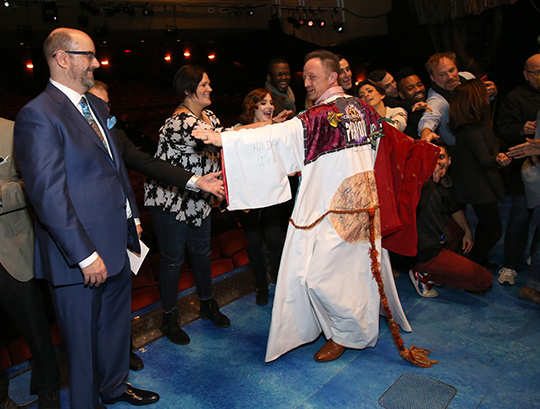 Matt Allen celebrates his Robe with fellow members of his cast. Photo by Walter McBride.