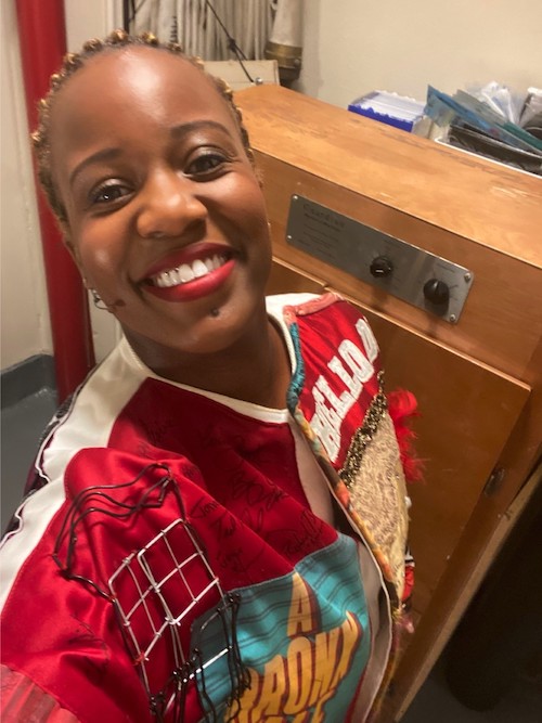 Anastacia McCleskey backstage at the Barrymore Theatre with the robe.