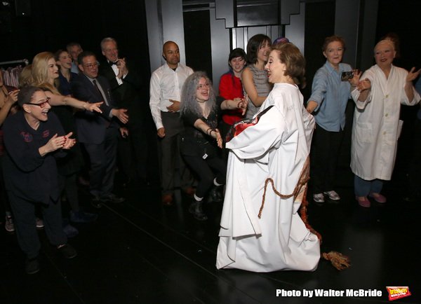 Joanna Glushak does the ceremonial three laps around the stage. Photo by Walter McBride.